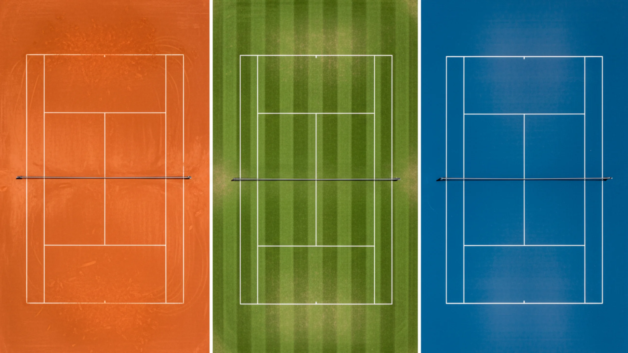 Tennisplätze mit verschiedenen Belägen nebeneinander - Sand, Rasen und Hartplatz
